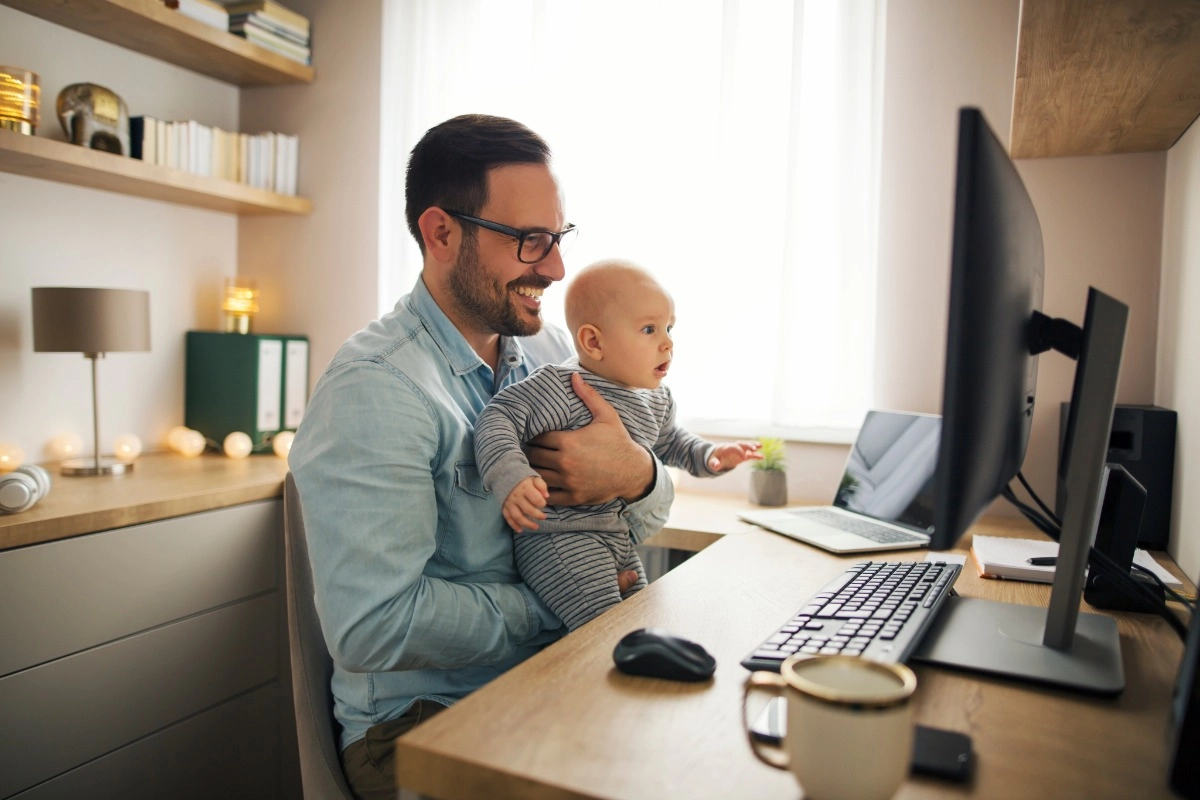 Father child watching video on screen facial expressions